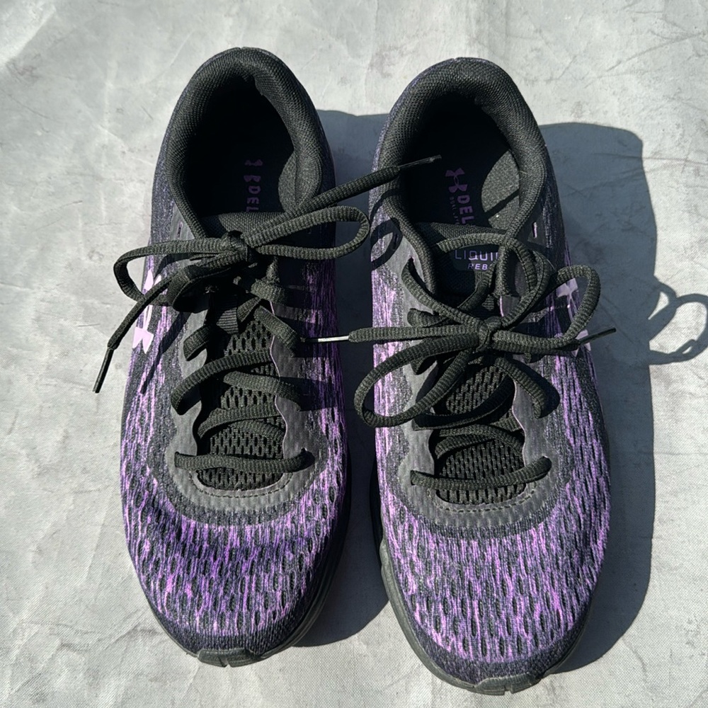 Under Armour size 8 1/2 black and purple